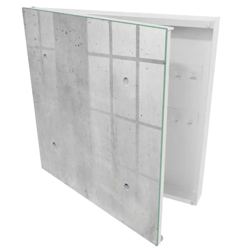 Nástěnná skříňka na klíče v minimalistickém designu se vzhledem surového betonu v šedých odstínech