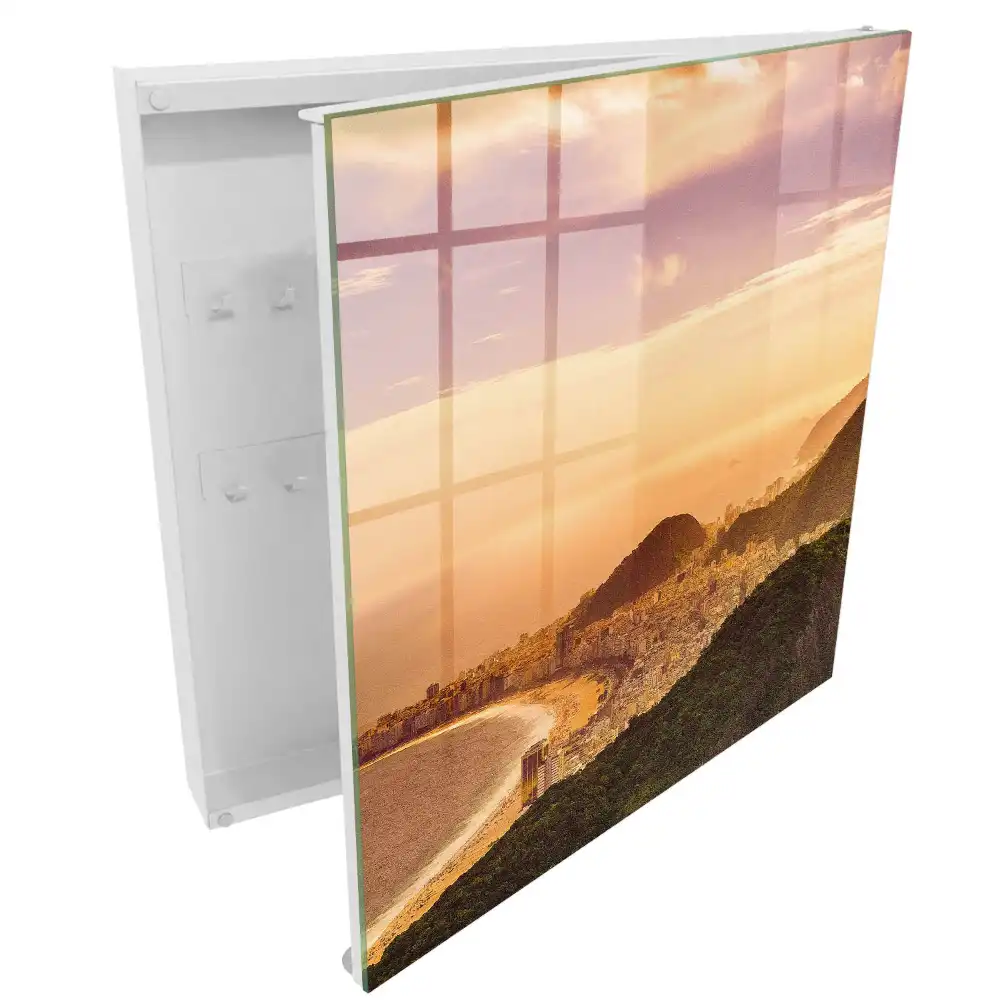 Nástěnná skříňka na klíče s motivem městské krajiny při západu slunce