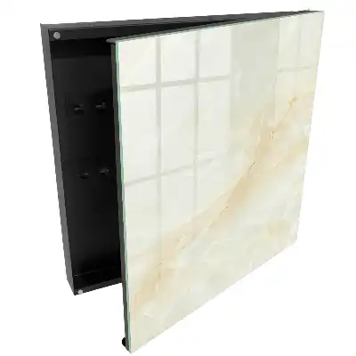Nástěnná skříňka na klíče v elegantním designu krémového mramoru