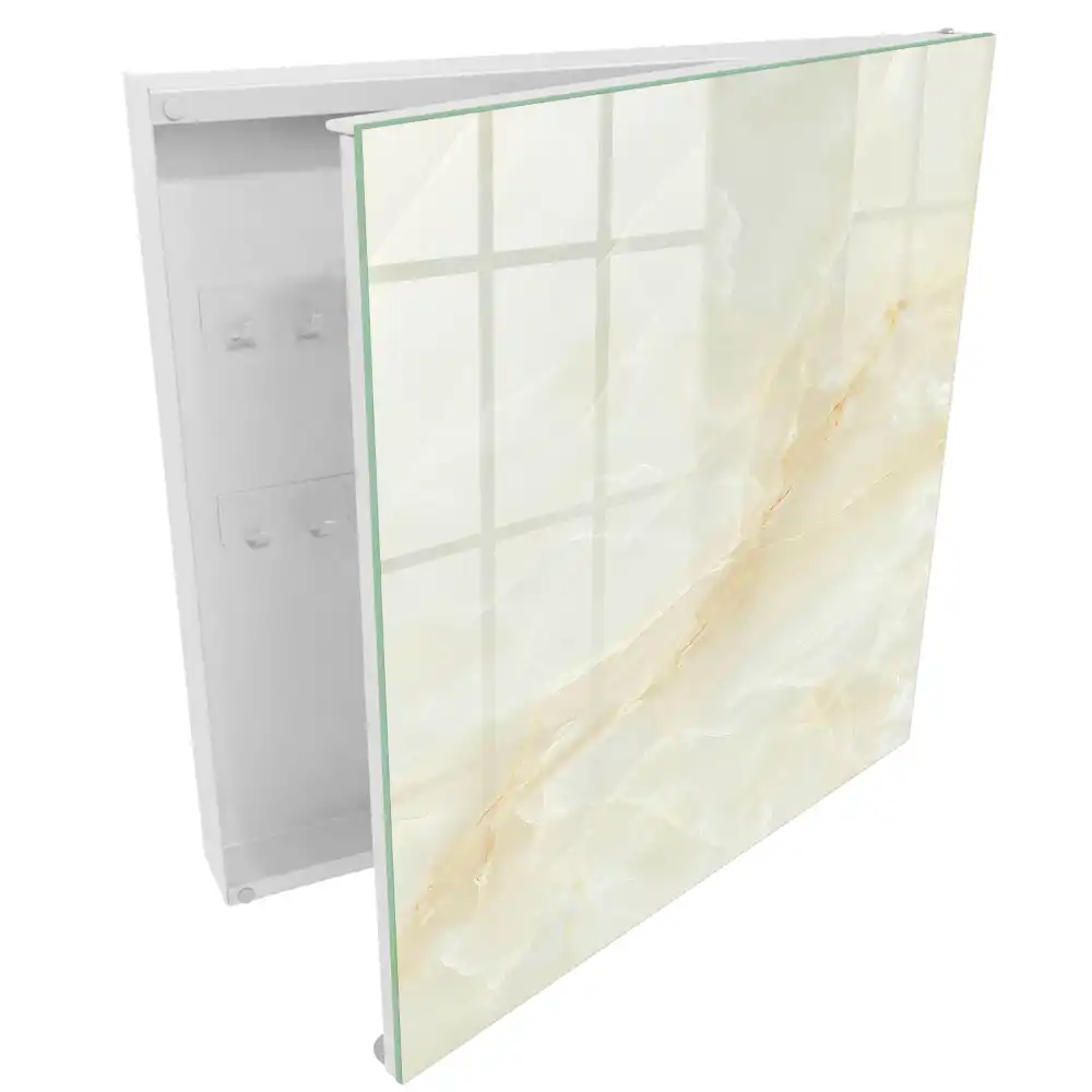 Nástěnná skříňka na klíče v elegantním designu krémového mramoru