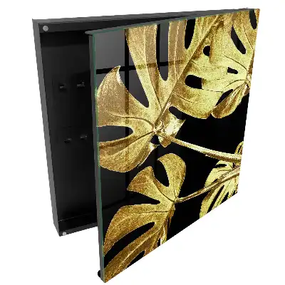 Elegantní box na klíče s motivem listů na černém pozadí