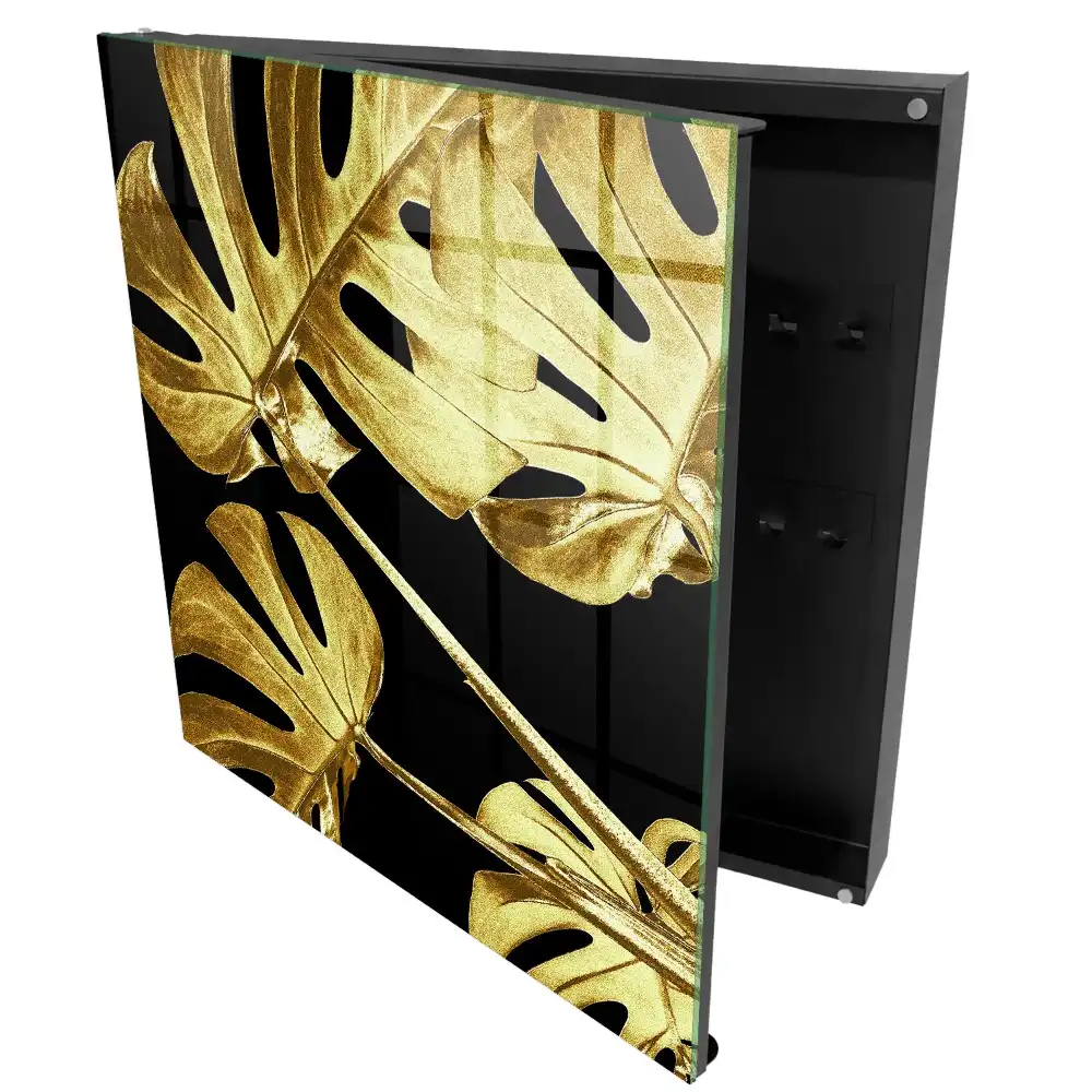 Elegantní box na klíče s motivem listů na černém pozadí