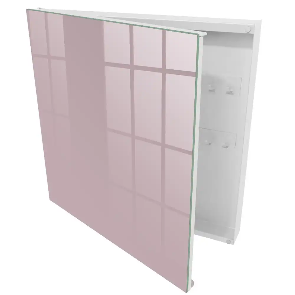 Minimalistická nástěnná skříňka na klíče v růžové barvě